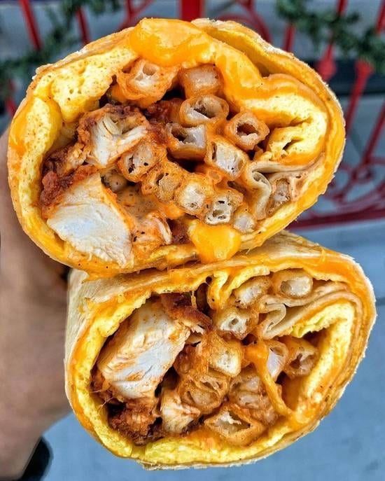 BREAKFAST FRIED CHICKEN BURRITO (CHICK-FIL-A) WITH HOME FRIES.