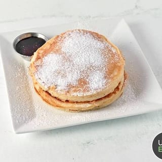 PLAIN PANCAKES SYRUP AND POWDER SUGAR