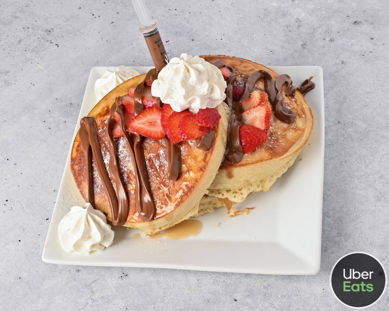 NUTELLA AND STRAWBERRIES PANCAKES.