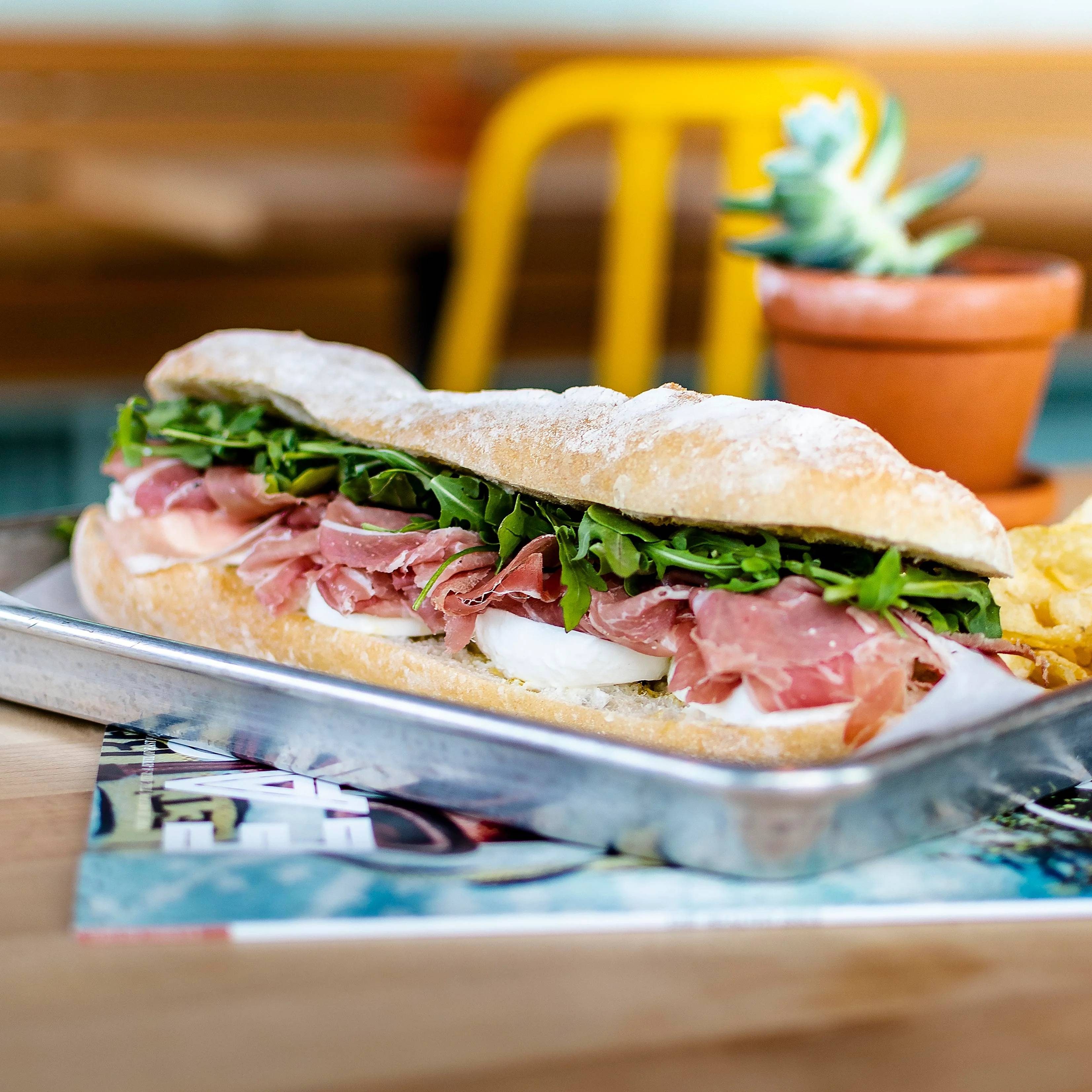 PROSCIUTTO SANDWICH WITH FRIES.