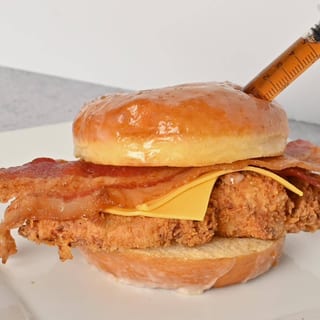 FRIED CHICKEN ON DONUT WITH FRIES (CHEESE &BACON)